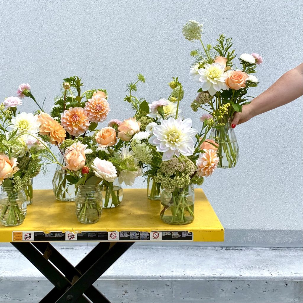 Seasonal summer flowers in glass vases