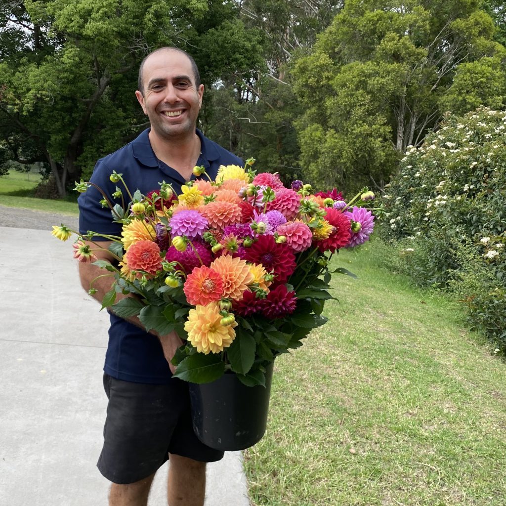Farmer Dave with his stunning summer dahlias.