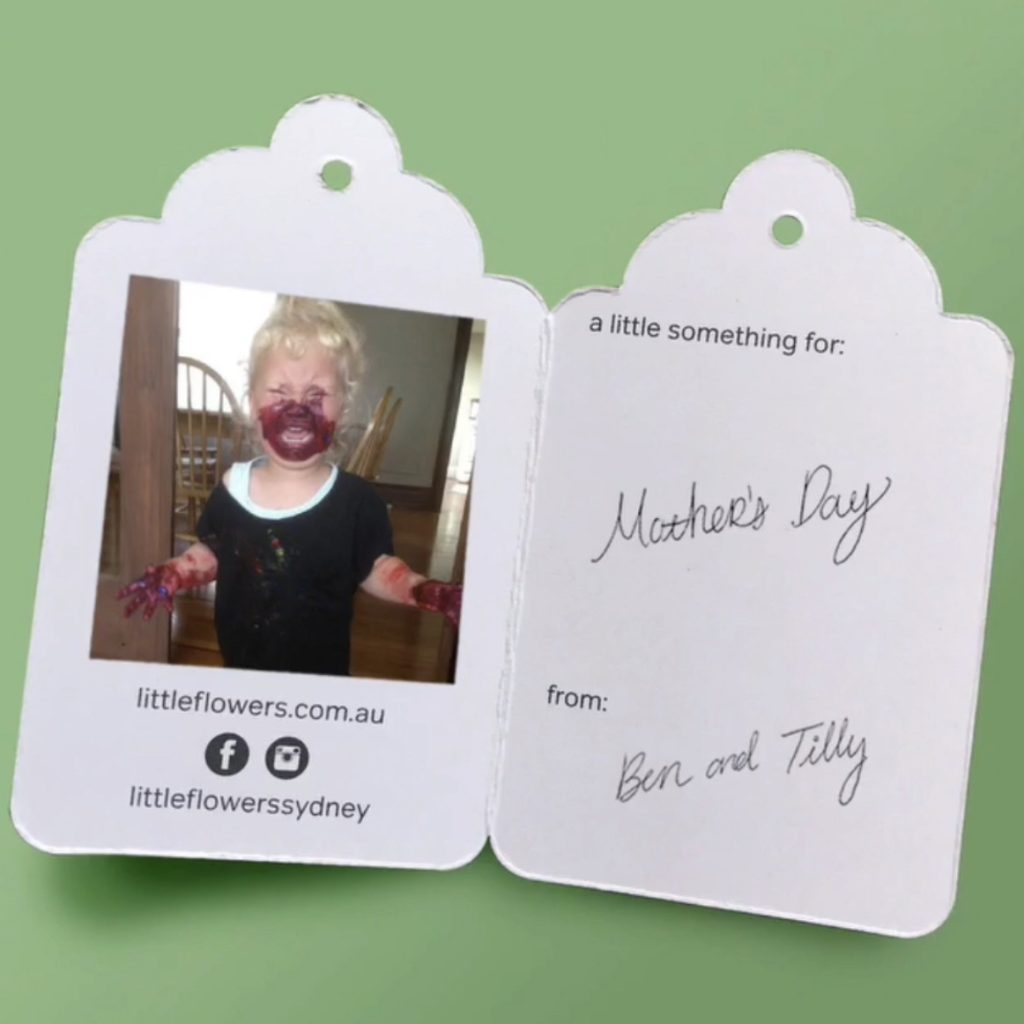 funny child photo tag attached to flower delivery